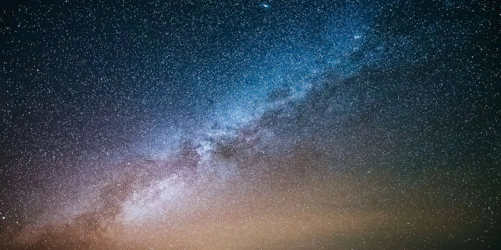 Guests stargazing with guide on Mauna Kea, Kona departure group