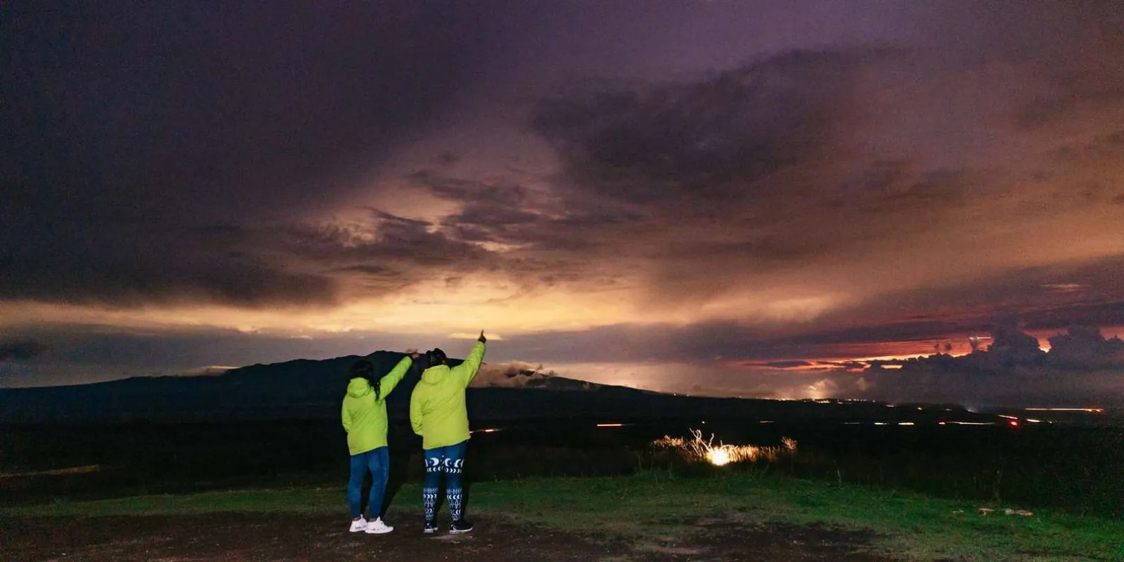 Group photo in warm parkas provided by the tour operator at Mauna Kea