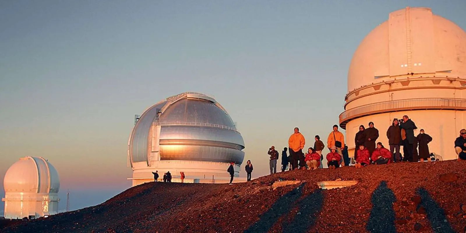 Private astronomer guiding couple through deep-sky objects on Mauna Kea